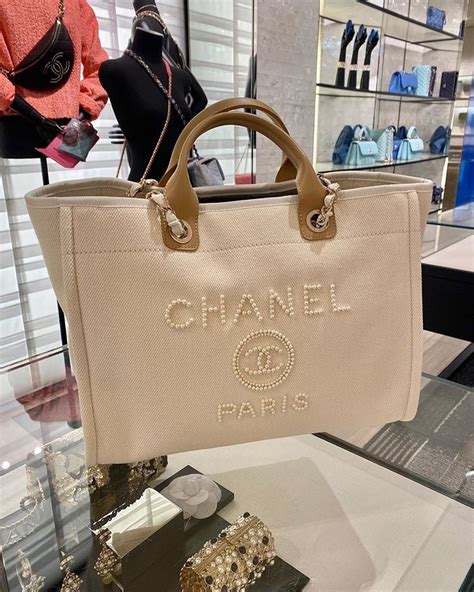 chanel pearl logo deauville bag|Chanel deauville tote 2022.